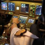 Ecrans et boutons de commande sur le B 777 de Skyway Simulation